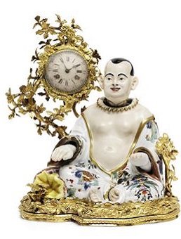 a_french_gilt-bronze_striking_mantel_clock_with_polychrome_porcelain_b_d5313044h.jpg