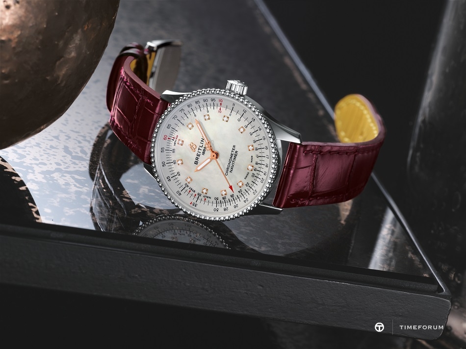 08_navitimer-automatic-35-with-a-white-mother-of-pearl-dial-with-diamond-hour-markers-and-a-burgundy-alligator-leather-strap-1.jpg