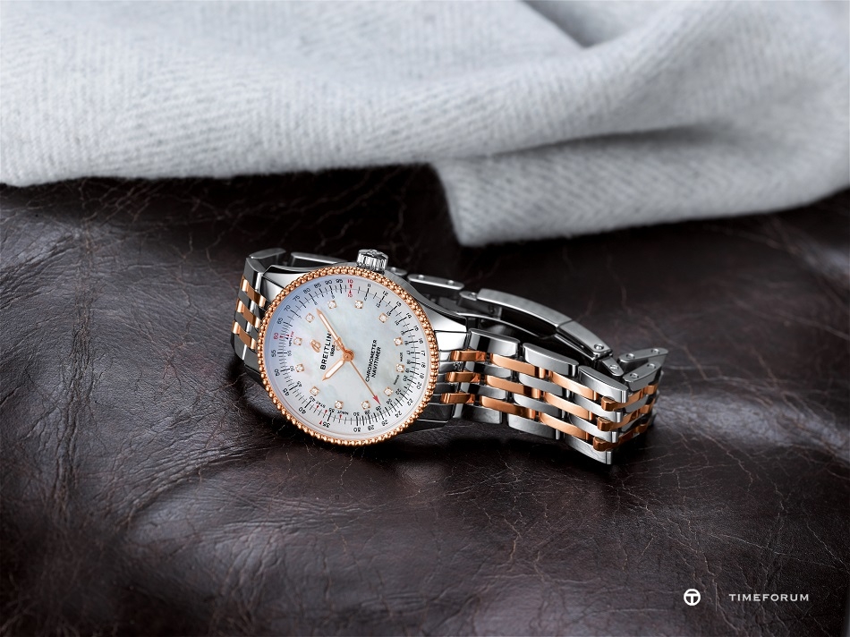 11_two-tone-navitimer-automatic-35-with-a-white-mother-of-pearl-dial-with-diamond-hour-markers-and-a-luxurious-18-k-red-gold-bezel-1.jpg